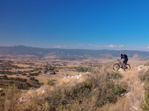 Mountain Biker ontop of hill Action Story Visual Legacy Productions / tellmystory.us
